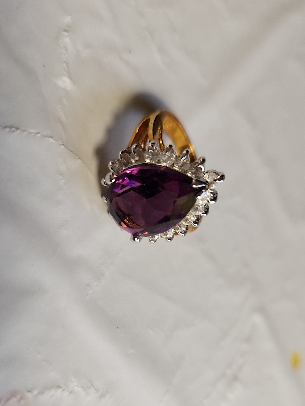 Gold-Tone Ring with Pear-Shaped Purple Stone and Halo